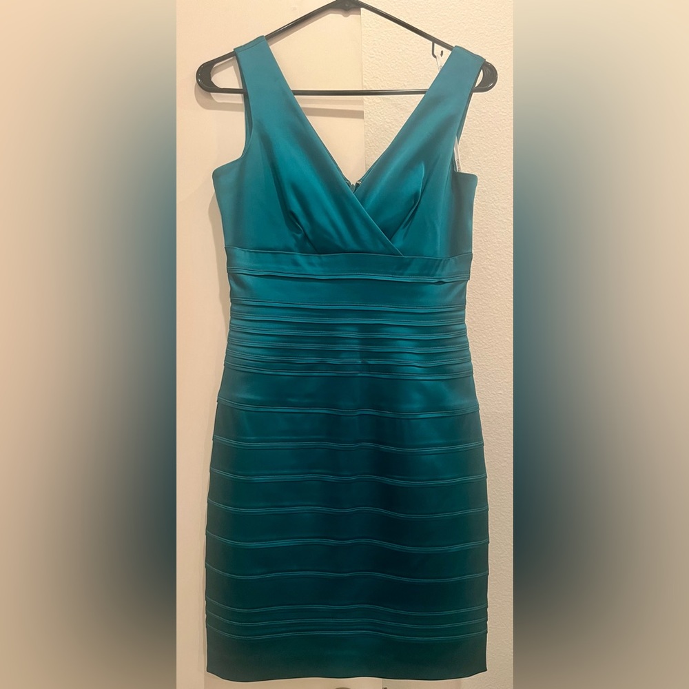 Worn once! Calvin Klein cocktail dress in turquoise teal blue satin, size 4P